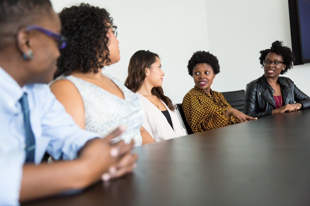 community interviewer talking to group