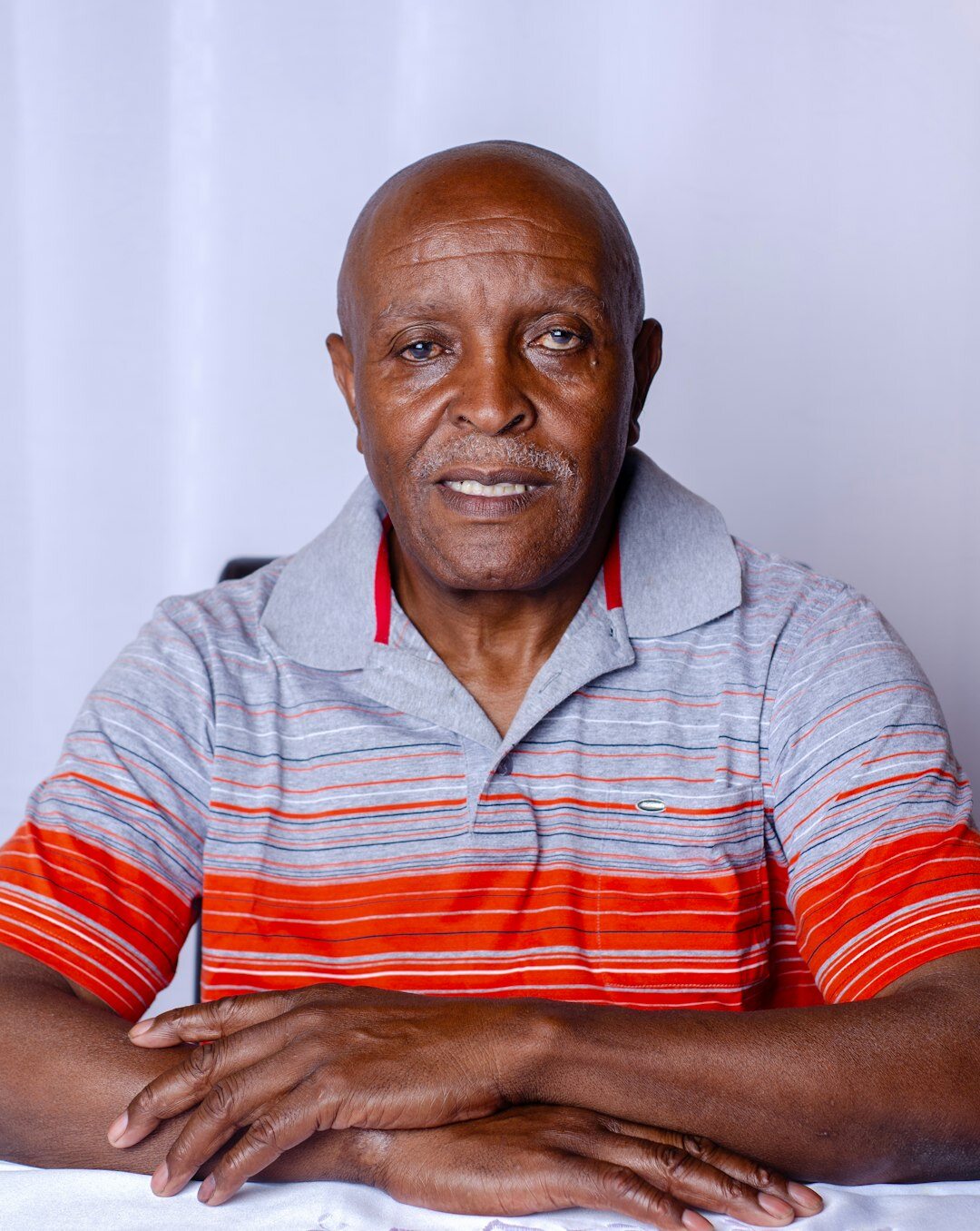 Studio portrait of a Dutch male television presenter in his fifties